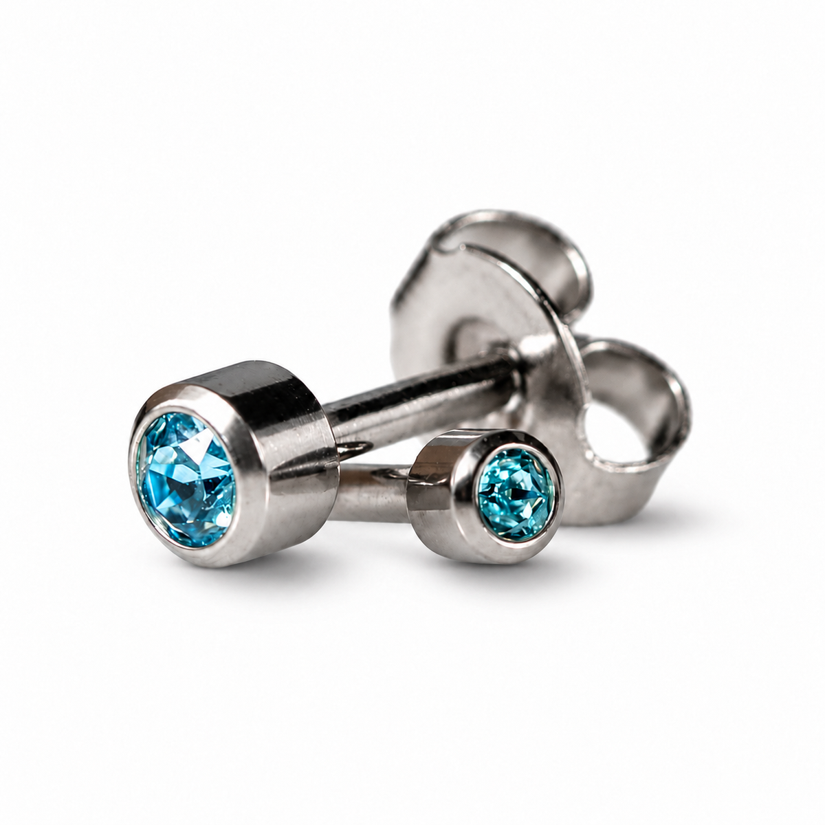 Caflon Mini Akvamarinas 3mm stud tipo auskarai su šviesiai mėlynu akmenėliu, nerūdijantis plienas